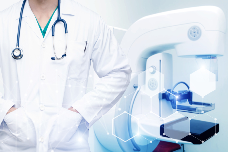 Image of a mammography equipment and a monitor showing how the results gets displayed.